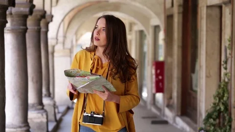 Woman with maps Stock Footage 106096169