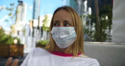 Woman with mask doing refusing hand gesture Stock Footage 139357266