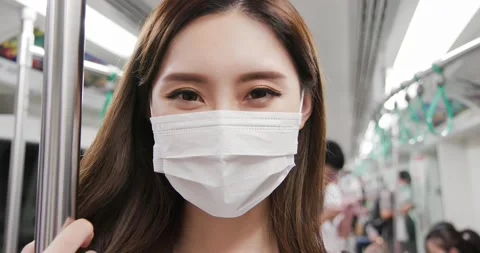 Woman with mask in mrt Stock Footage 137621658