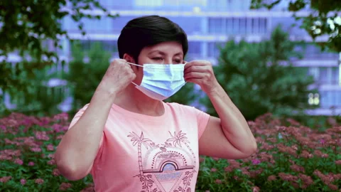 Woman mask outdoor Stock Footage 135008564