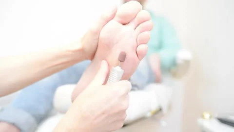 Woman master pedicures a man. Stock Footage 130614848