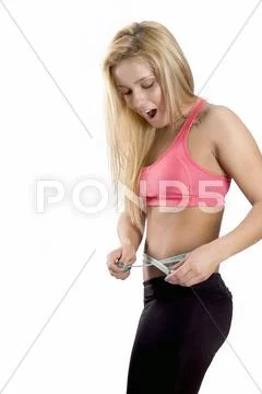 Woman measuring her waist Stock Photos