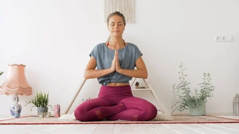 Focused Woman Meditating In Lotus Posture