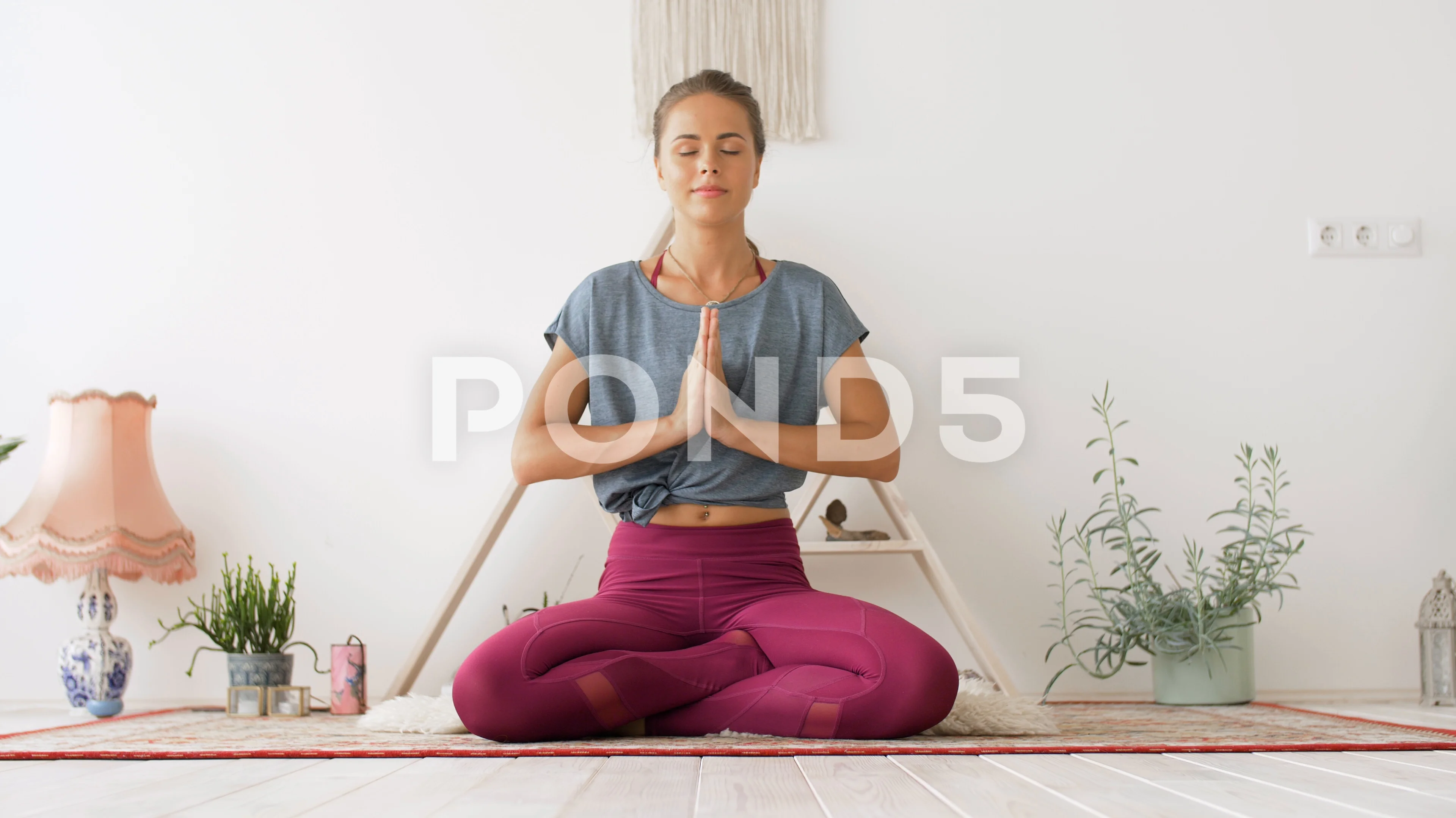 Workout, calm asian young woman, girl hand in calm pose sitting practice  meditating in lotus position on mat at home, meditation, exercise for  wellbeing, healthy care. Relaxation, happy leisure. 23825517 Stock Photo