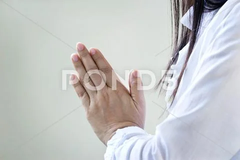 Woman meditating of purity energy insight on pastel background Stock Photos