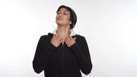 Woman of Middle Eastern descent feeling strong and confident crosses her arms Video stock 131781007
