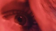 Woman Model Pupil Dilating Under Bright Colorful Lights In Studio Stock Footage