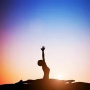 Peaceful young woman in zen yoga position, meditating