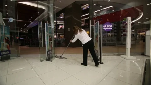 Woman mopping store 스톡 동영상 77052091