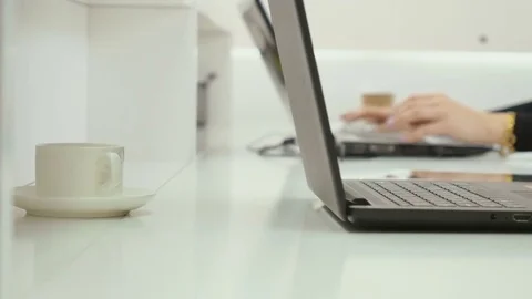 Woman move fingers thinking about work, close-up, female hands near laptop Stock Footage