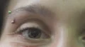 woman moves her brown eye HD Footage