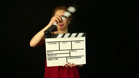 Woman with a movie clapper Stock Footage
