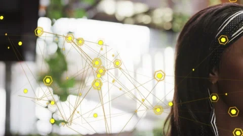 Woman moving into frame, causing yellow node network shifting and aligning near Stock Footage 333609712