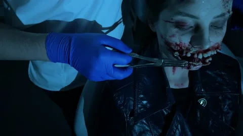 Woman mutant pull a tooth out in dental clinic. Stock Footage 146081045