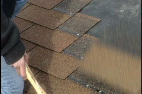 Woman nails down roofing Stock Footage 442491