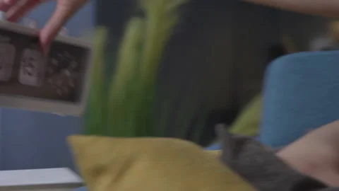 Woman napping on the sofa at home Stock Footage 150839523