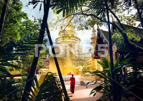Woman near old Temple in Thailand Stock Photos