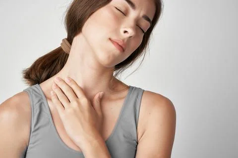 Woman with neck pain health problems medicine injury Stock Photos