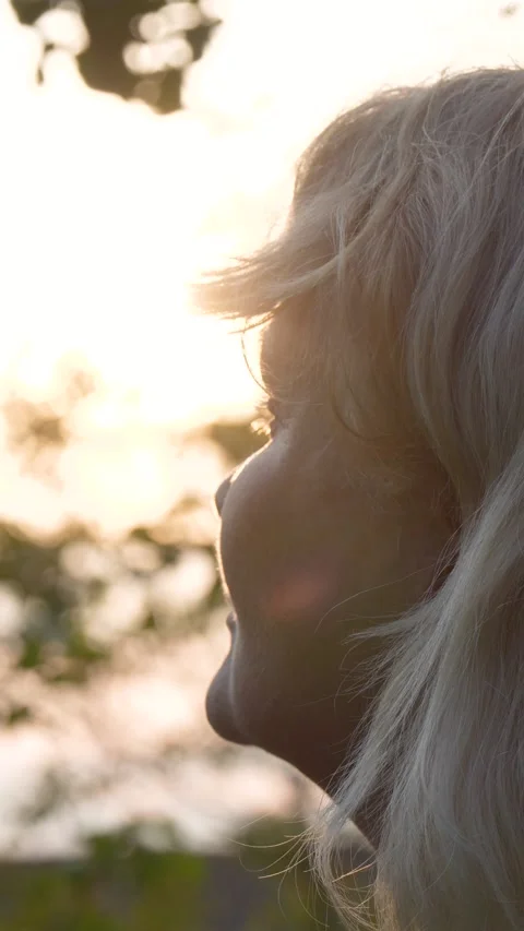 Woman observing sunset Video stock 314454320