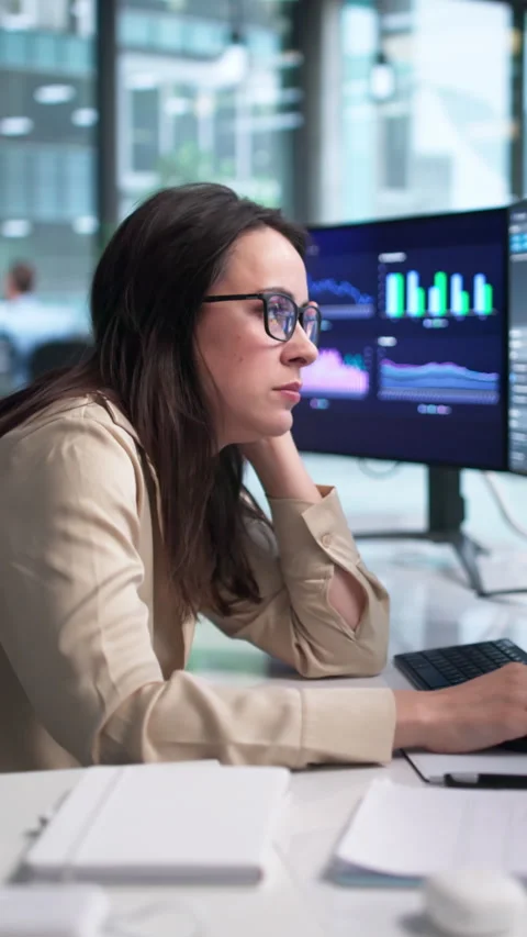 Woman At Office Computer Looking Stressed And Overwhelmed Stock Footage 338172047