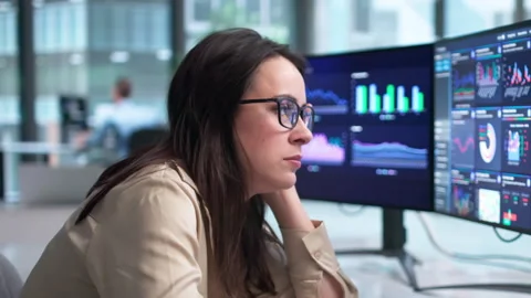 Woman At Office Computer Looking Stressed And Overwhelmed Stock Footage 339179241