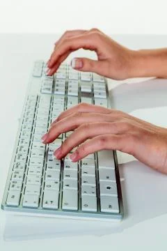 Woman in office with computer Stock Photos