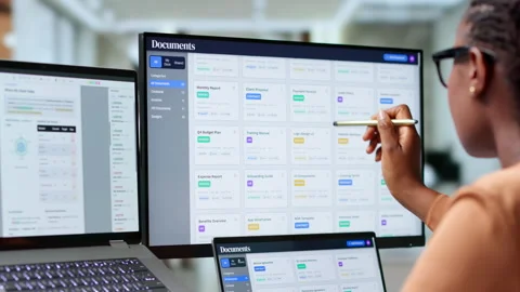 Woman Office Manager Efficiently Organizing Digital Documents Stock Footage 344722101