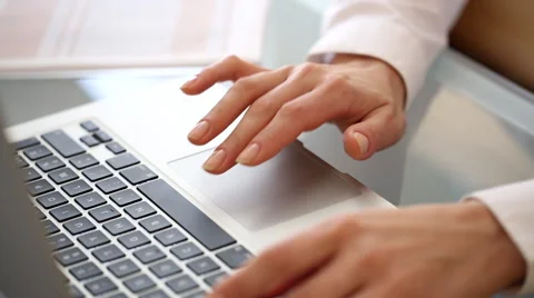 Woman in office typing on the keyboard computer Stock Footage