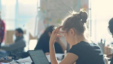 Woman office worker checking text document on digital tablet irrl coworking open Stock Footage 137560699