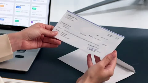 Woman Opening Emvelope With Payroll Check. Stock Footage 339179600