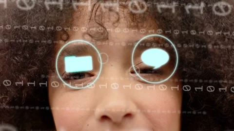 Woman opening eyes while binary streams appearing and spawning icons over eyes, Video stock 333924906
