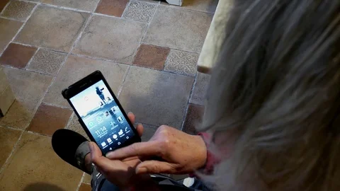 A woman opens the browser on the phone, the message "no connection" appears Stock Footage 102231947