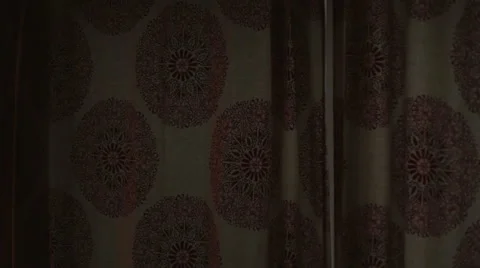 Woman opens curtain on snowy day, video Video stock 59045025