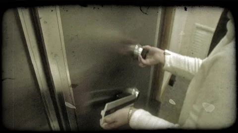 Woman opens vault at bank. Vintage stylized video clip. Stock Footage