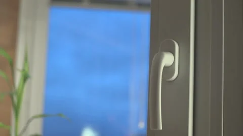 Woman opens window  Video stock 65970010
