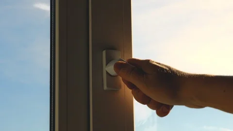 Woman opens the window Stock Footage 90353177