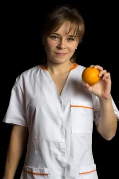 Woman with orange Stock Photos