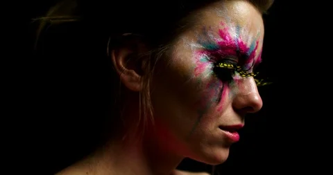 Woman With Painted Face Posing for the Camera Stock Footage 91413152