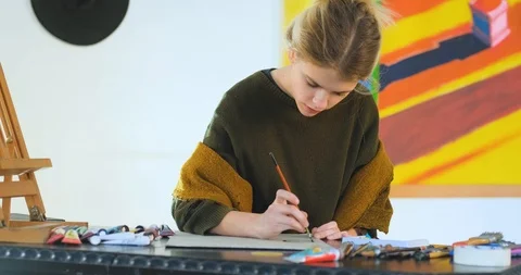 Woman painter in workshop Stock Footage 125313875