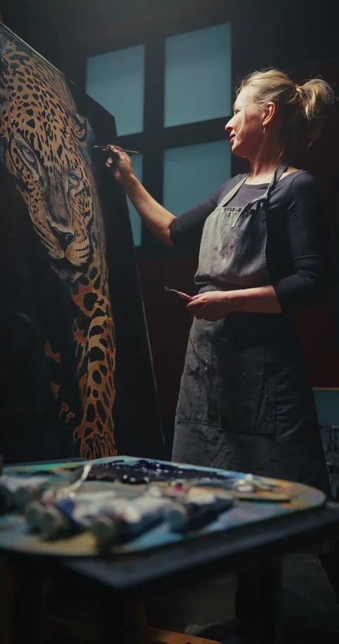 Woman Painting a Leopard Portrait Stock Footage 275147853