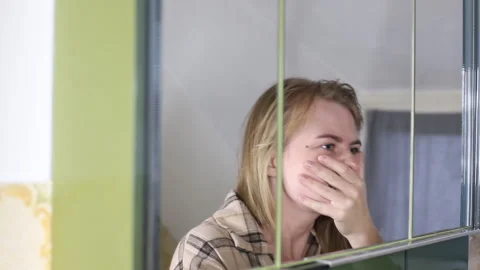 Woman in  panic attack in the bathroom Stock Footage 263203160