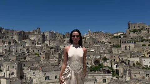 Woman with Panoramic View of Sassi di Matera Italy Stock Footage 336672799