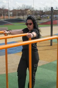 Woman on the parallel bars Stock Photos