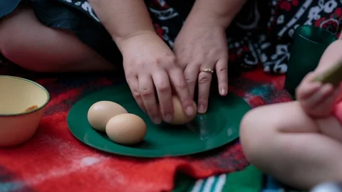 Woman peeling boiled egg shells Stock Footage 94882785
