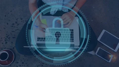 Woman peeling sticky note while typing, cybersecurity HUD forming, placing Stock Footage 334729081