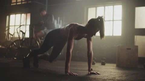 Woman performing push-ups Video stock 236190461