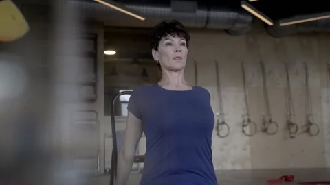 Woman performs an exercise and explains something Video stock 102547369