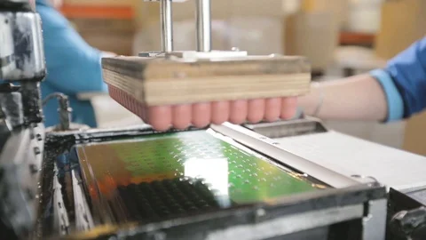 Woman performs work on the machine. Toy Factory. Stock Footage 97136233