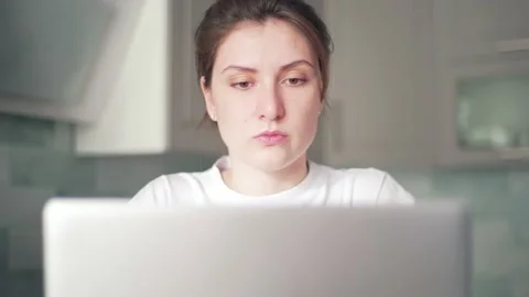 A woman performs work while at home in quarantine. Freelancer does the job Stock Footage 130209118