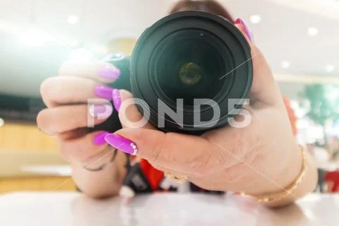 A woman photographer is being prepared Stock Photos